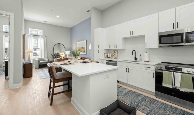 a kitchen with white cabients