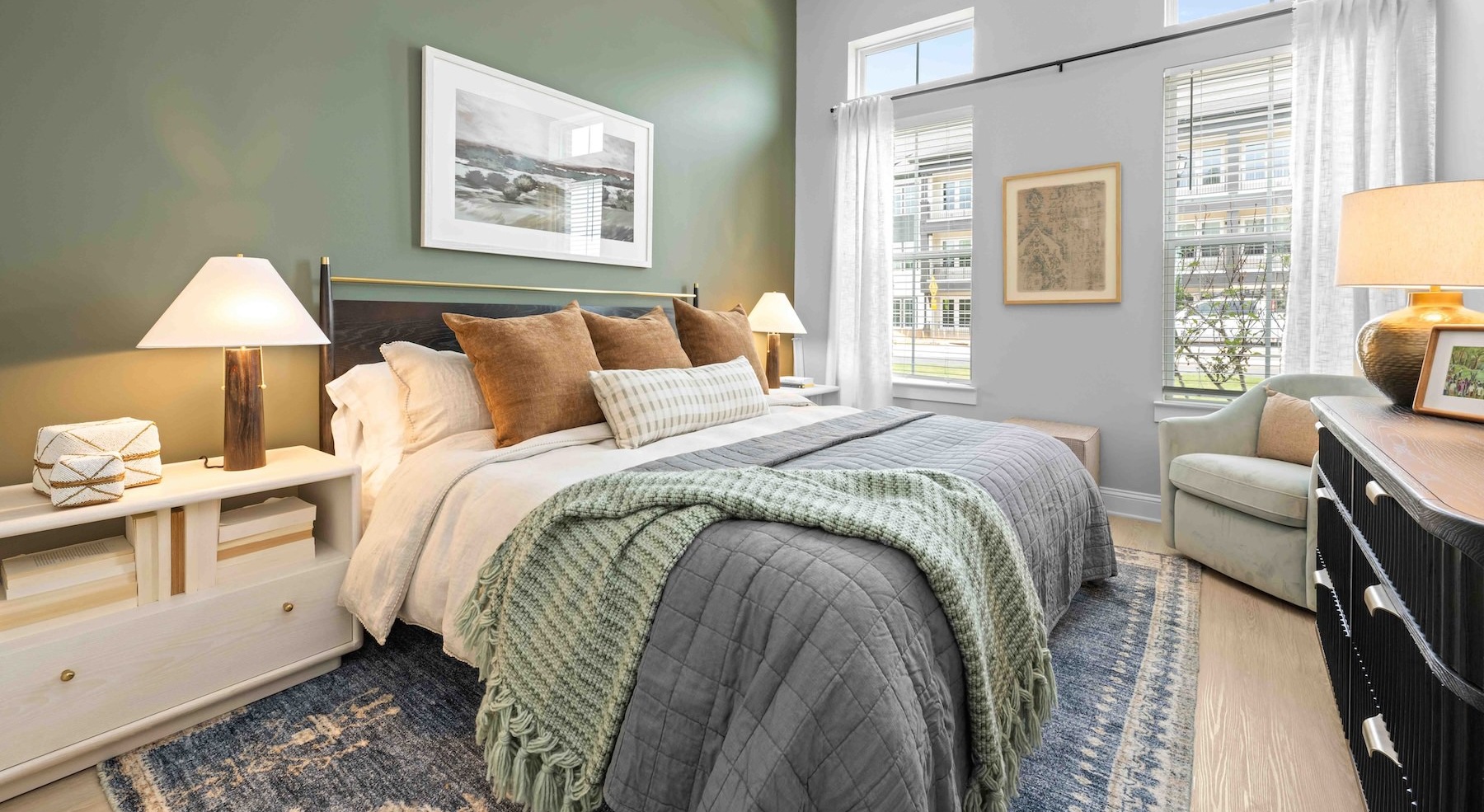 a bedroom with a bed and two nightstands