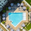 an aerial view of a swimming pool in a courtyard